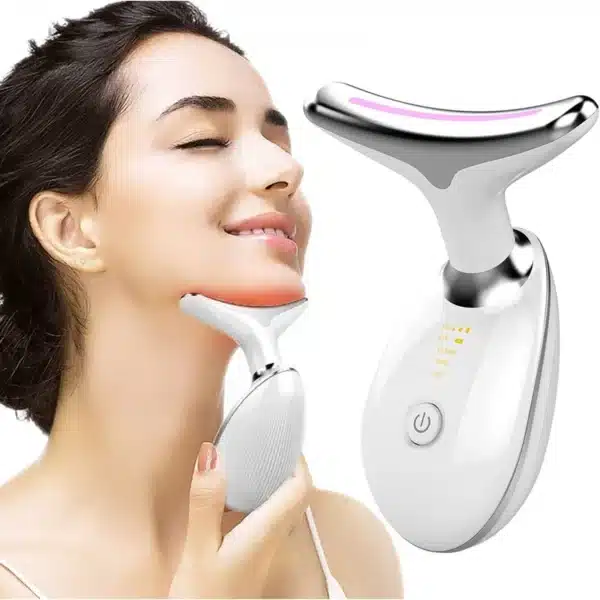 Woman using EMS device on jawline for skin tightening and rejuvenation