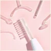 Close-up of high frequency wand glass electrodes on soft pink background